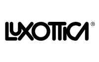 The image shows the Luxottica logo in bold, black, stylized letters on a light gray background.