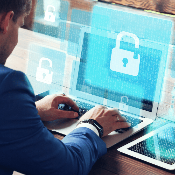 A person uses a laptop displaying a digital padlock symbol, representing cybersecurity or data protection in service desk management, with holographic padlock icons and matrix-style binary code in the background.