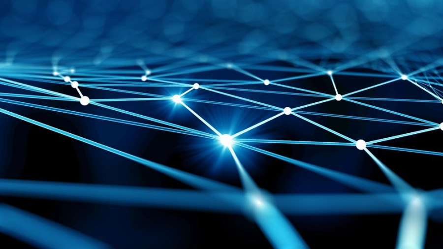 A digital illustration of interconnected glowing blue lines and white nodes on a dark background, representing a network or neural connections in a futuristic style.
