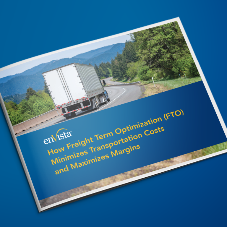 A booklet on a blue surface displays a cover image of a semi-truck driving on a highway through a scenic, wooded landscape. The title reads: How Freight Term Optimization (FTO) Minimizes Transportation Costs and Maximizes Margins.