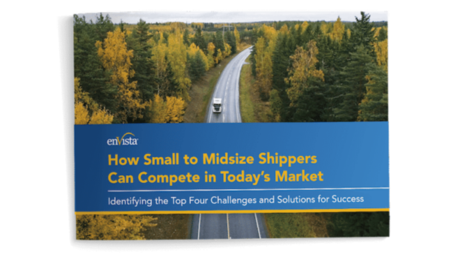 A booklet with a cover showing a truck driving on a road through a forest with green and yellow trees. The title reads, How Small to Midsize Shippers Can Compete in Todays Market.