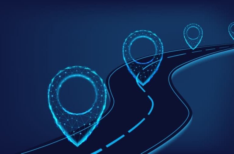A dark blue digital illustration of a winding road with three glowing, futuristic location pins made of light and geometric lines placed along the route.