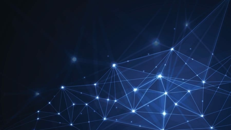A dark blue abstract background with glowing points connected by thin lines, forming a network or web-like pattern representing digital connections or technology.
