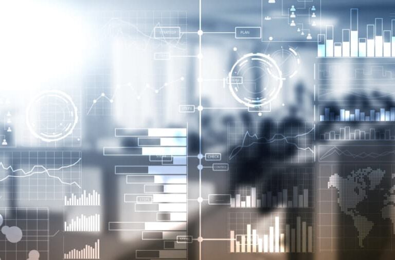 Abstract image of digital business data visualizations, such as bar charts, line graphs, circular diagrams, and a world map—highlighting Impact Analytics—overlaid on a blurred office background with people and desks.