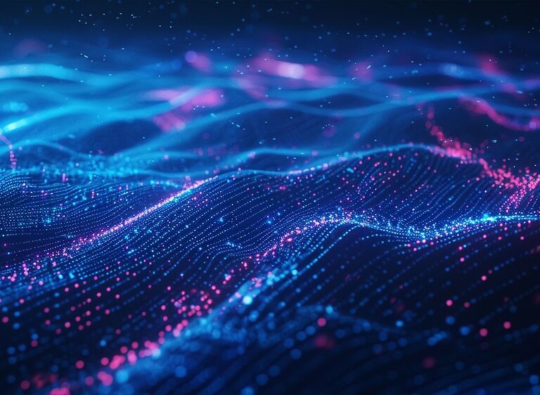 A digital abstract image showing glowing blue and pink dots forming wave-like patterns, resembling a futuristic cloud computing landscape or data visualization, set against a dark background.