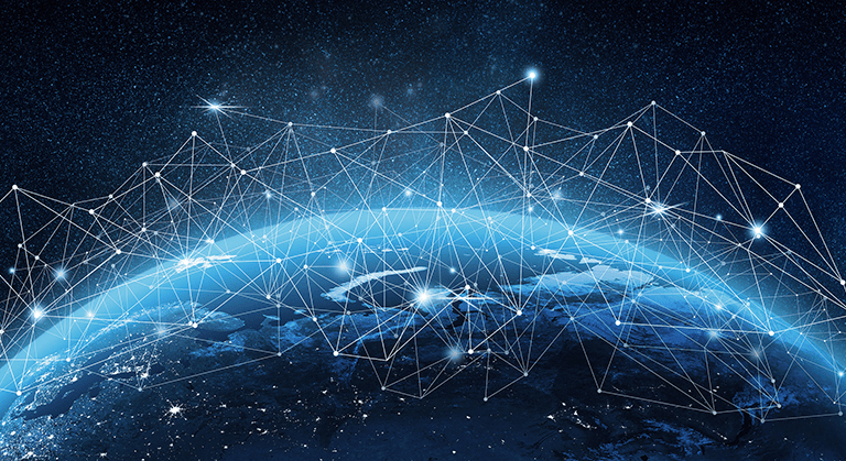 A view of Earth from space with glowing network lines and nodes connecting various points, symbolizing global communication and digital connectivity across the planet.