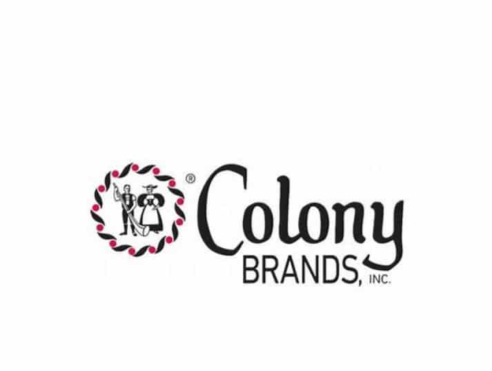 Colony Brands, Inc. logo featuring two figures inside a decorative circular border, with the company name “Colony BRANDS, INC.” written to the right in black text on a white background.