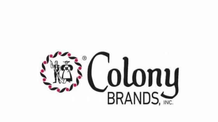 Colony Brands, Inc. logo featuring stylized text and an illustration of two people inside a circular border made of leaves or berries.
