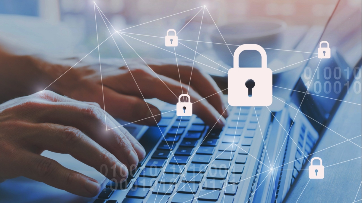 Close-up of hands typing on a laptop keyboard, with digital padlock icons and connecting lines overlaid, symbolizing cybersecurity, security management, data protection, and secure online communication.