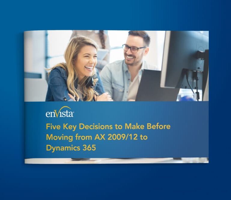 A smiling woman and man sit at a desk with a computer. The text on the image reads: Five Key Decisions to Make Before Moving from AX 2009/12 to Dynamics 365 with the enVista logo above the text.
