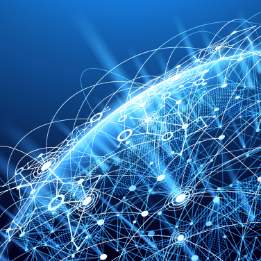A digital illustration of Earth from space, overlaid with glowing blue network lines and nodes, symbolizing global connectivity and the vital role of supply chain strategy in advanced technology.