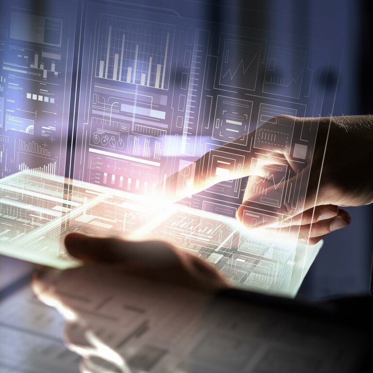 A person’s hand interacts with a glowing transparent tablet, surrounded by futuristic digital data displays and graphs, symbolizing advanced technology and data analysis.