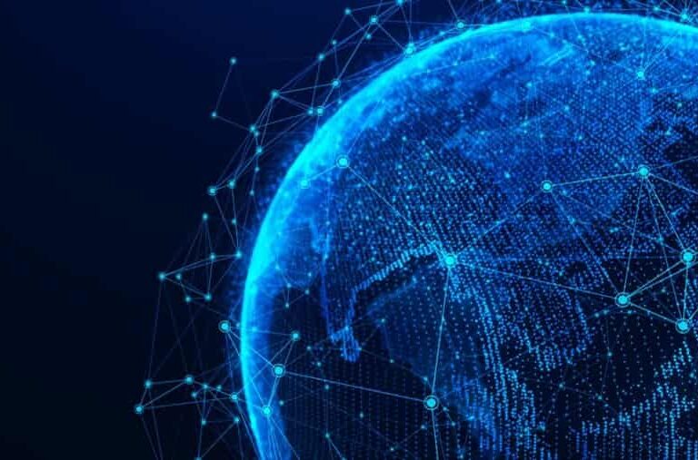 A digital, blue-toned rendering of Earth viewed from space, overlaid with glowing network lines and connection points, symbolizing global connectivity and data exchange.