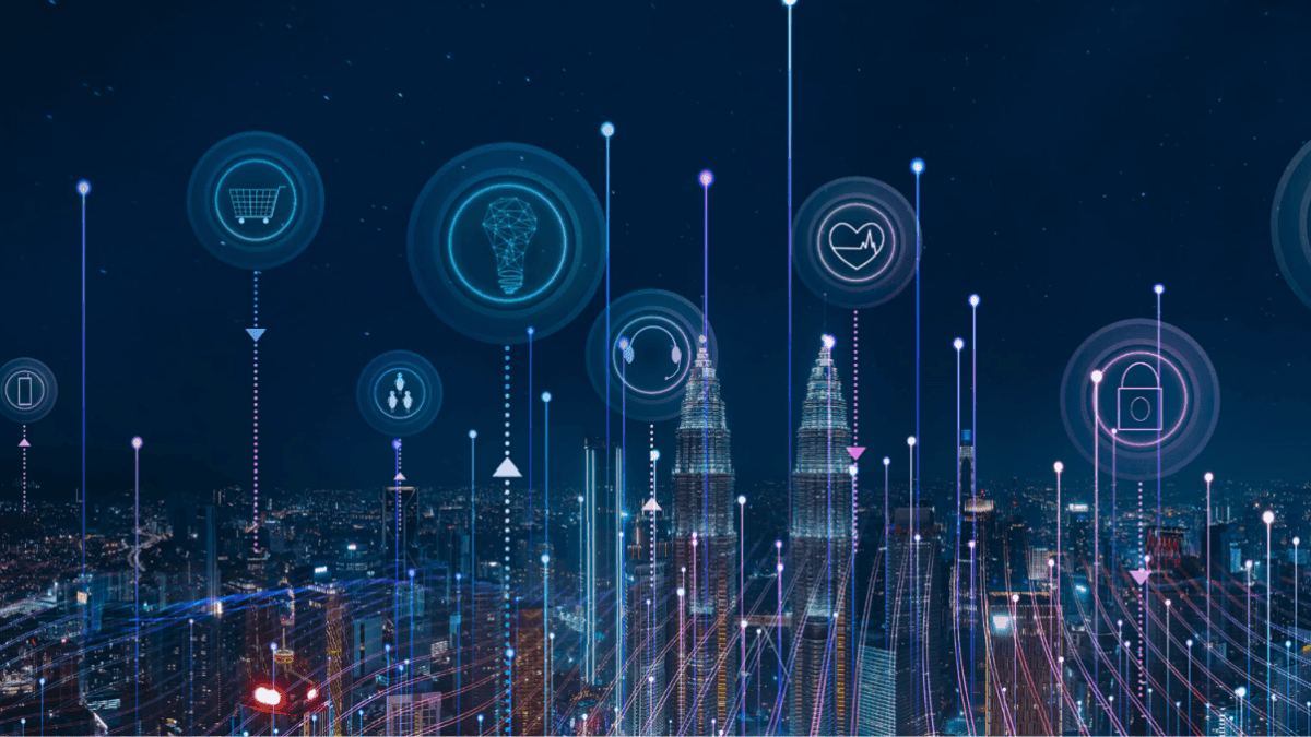 A futuristic city skyline at night with glowing digital icons above buildings, representing technology concepts like shopping, healthcare, security, cloud storage, gears, and communication. Lines connect the icons to the city below.