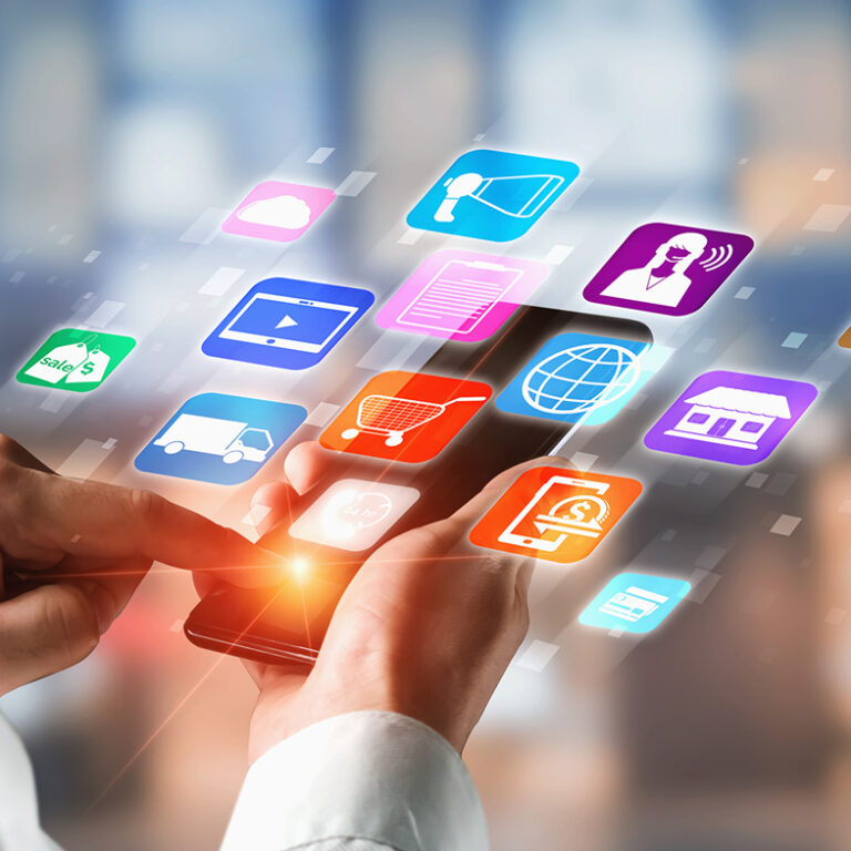 A person uses a smartphone with colorful digital app icons, including a shopping cart and retail OMS, floating above the screen, symbolizing technology and mobile applications.