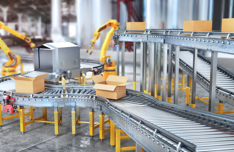 A modern factory with robotic arms and a conveyor system moving cardboard boxes, illustrating automation selection in an advanced packaging and assembly process.