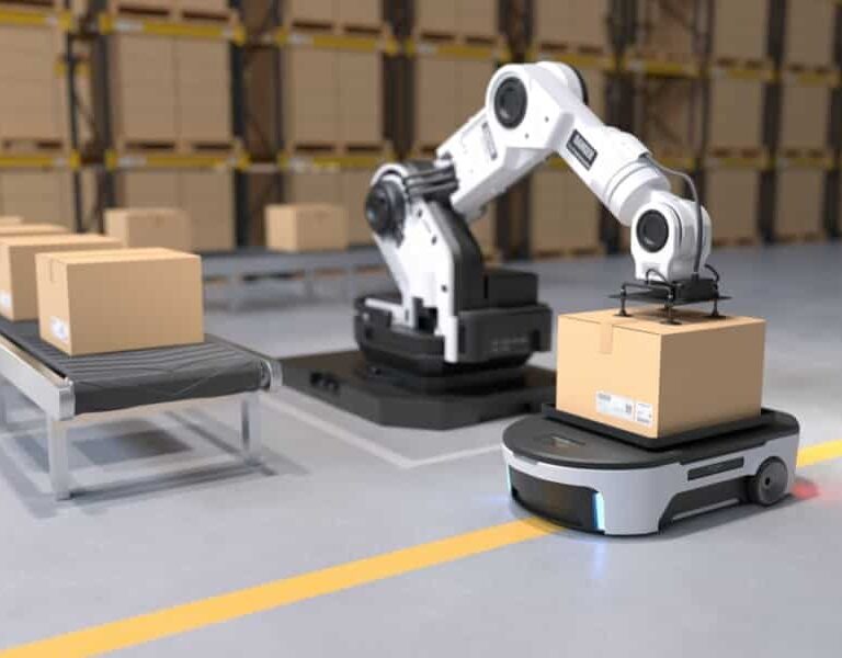 A robotic arm places a cardboard box onto a mobile robot in a warehouse, offering a glimpse into the future of supply chain, with shelves of boxes in the background and a conveyor belt carrying more boxes on the left side.