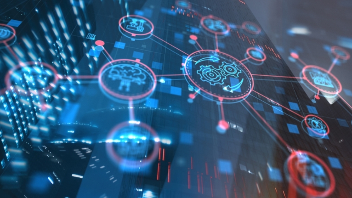 A digital illustration of interconnected technology icons, such as gears and cloud, overlaid on a cityscape at night, symbolizing concepts like automation, networking, and smart technology.