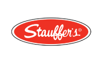 Stauffers logo featuring the brand name in white script inside a red oval with a white border.