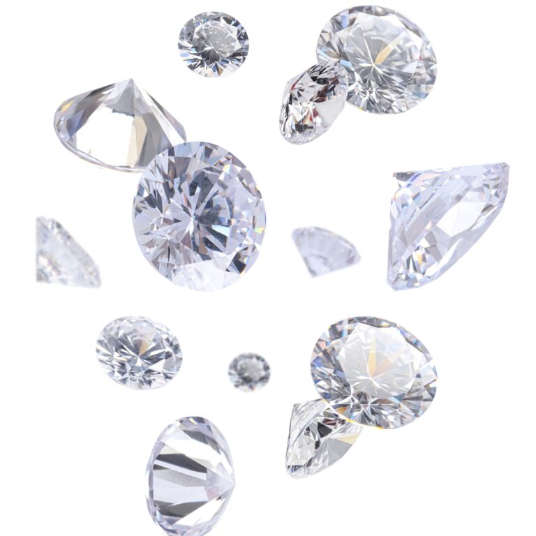 Multiple sparkling, round-cut diamonds of various sizes float against a white background, showcasing their brilliant facets and reflective surfaces.