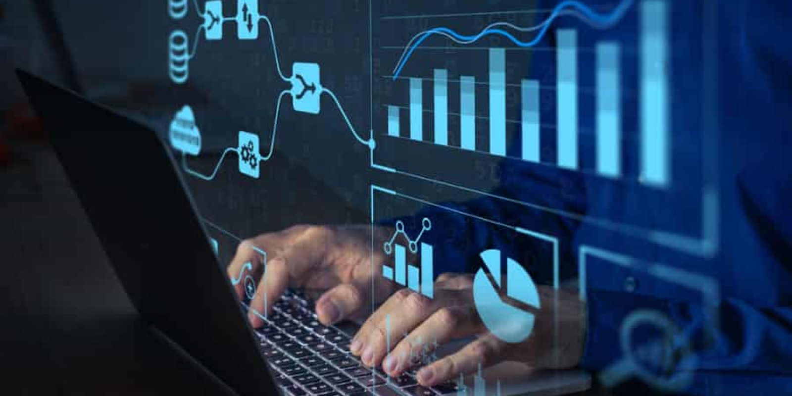 Person typing on a laptop with transparent digital graphs, charts, and ERP data flow diagrams displayed in the foreground, representing advanced data analysis or business analytics.