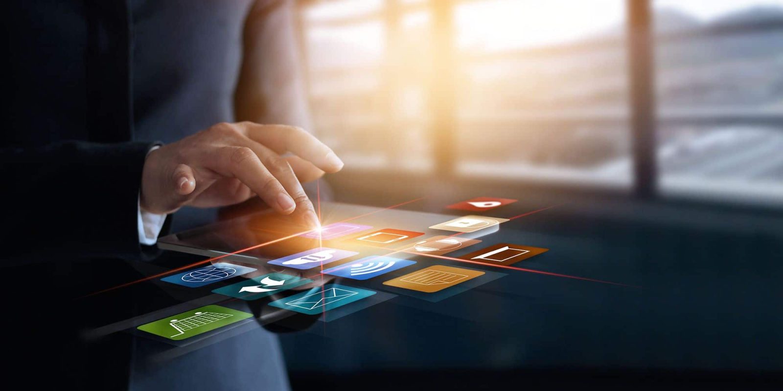 A person in a suit interacts with floating digital icons, representing various apps and technologies—visually exploring what is omnichannel fulfillment—against a blurred office background.